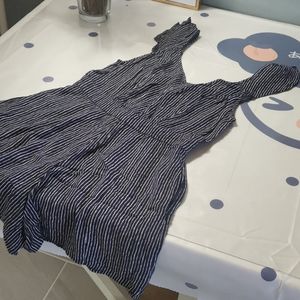 American Eagle navy blue & white striped romper with pockets